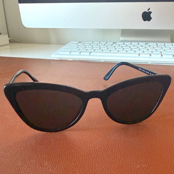 Prada Sunglasses - Picture 1 of 7